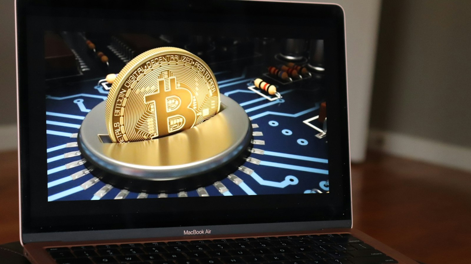 Laptop screen displaying a cryptocurrency price chart